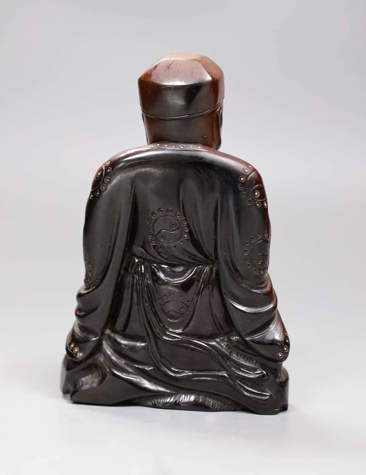 A Chinese composition figure of a seated musician, 12cms high
